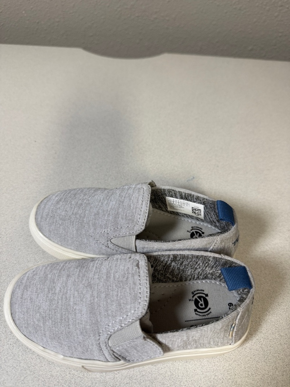 Toms Slip-On Shoes in Light Gray with Blue Heel Tabs - Picture 7 of 7